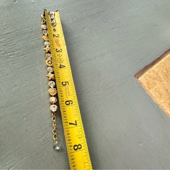 Sabika LIKE Gold Tone Nautical Seashell Bracelet - Picture 3 of 9